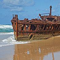 Rusty hulk of the New Zealand hospital ship SS Maheno shipwreck on Fraser Island, Hervey Bay, Queensland, Australia