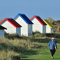 Colourful beach cabins at Gouville-sur-Mer, Normandy, France