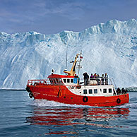Tourist boat in the Kangia Icefjord, Disko-Bay, West-Greenland, Greenland
