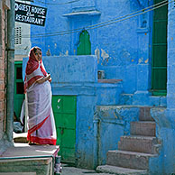 Woman wearing traditional sari in the blue city of Jodhpur, Rajasthan, India