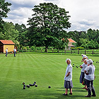 Elderly people playing bowls tournament in Yorkshire, England, UK